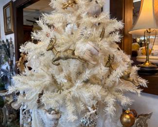 white Christmas trees with vintage ornaments