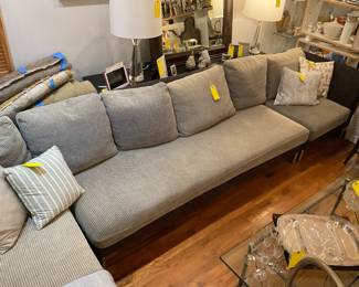 Charcoal and cray colored 3-piece sectional couch (length=13” height of seat=17” height of seat=64”) $1400 + tax