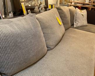 Charcoal and cray colored 3-piece sectional couch (length=13” height of seat=17” height of seat=64”) $1400 + tax