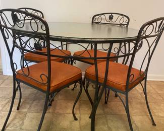 Wrought iron/ glass table and chairs