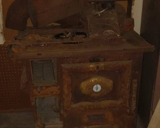 cast iron wood burning stove. complete with all partss included