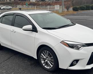 2015 TOYOTA COROLLA WITH ONLY 9700 MILES. THIS CAR IS LIKE A NEW ONE