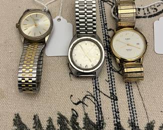 Total of four men watches, all self winding and working