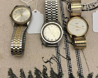 Total of four men watches, all self winding and working