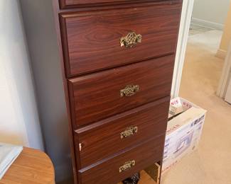 This is $5. Could be a fun project. paint it and put a basket in the bottom where the broken drawer is.