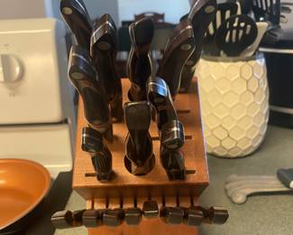 $450.  Eighteen piece catch knife set. 