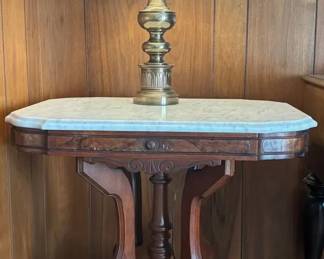 Vintage Carved Wood Marble Top Side Table on Wheels With Metal Table Lamp