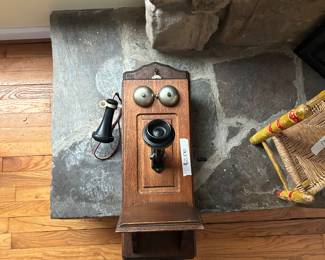 Old wall phone, antique still has wires and internal workings