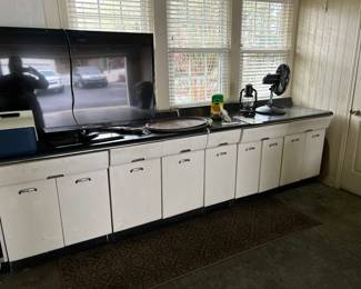Metal cabinets, also have wall cabinets 50’s style kitchen