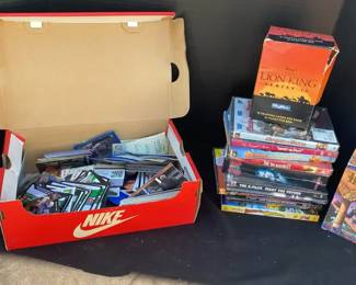 Mixture Of Collectible Cards And Some Movies