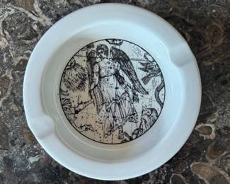 Lots of collected ash trays and catch-all items