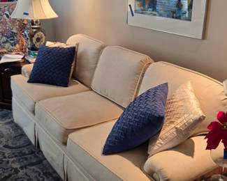 #41	Fine Designs Sofa Gallery Cream Sofa w/loose back Cushions (has stains on underside of sofa cushions) - 87" Long with Decorative Pillows	 $150.00 
