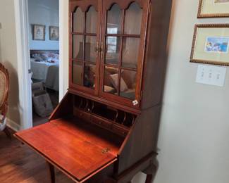 #28	Wood Secretary w/flip-down Desk Front w/cubbies & Wood/Glass Doors - 29.518-30x71 (2 pieces)	 $75.00 
