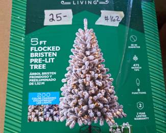 #162	5' Flocked Pre -Lit Bristen Christmas Tree 	 $25.00 
