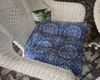 #54	White Plastic Wicker Round Table w/4 Chairs (kept inside patio) w/cushions - 38x30 Table 	 $150.00 
