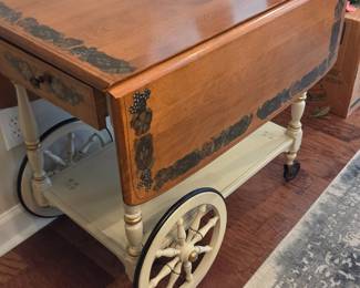 #49	Ethan Allen Tea Cart Cream Painted w/Wood Top W/Decorative Top w/side Drawer on Wheels w/Flip-up Sides - 37x20.5-42x30	 $150.00 
