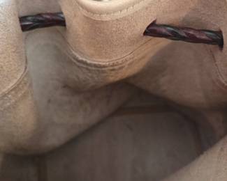 #105	Vintage Dooney & Bourke Pebbled Leather Drawstring Bucket Bag (interior ink marks)	 $50.00 
