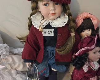 #127	Geppeddo Porcelain Doll on Stand	 $25.00 
