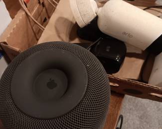 Apple home Pod and Arlo wireless surveillance cameras