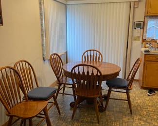 Round extension table, six chairs.