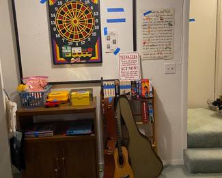 Electronic Dart board, guitar.