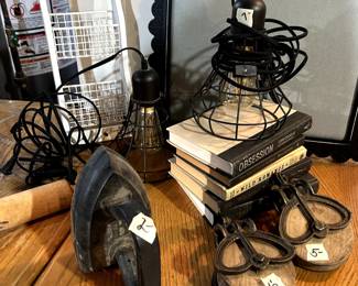 door stop iron, two pulleys (decorative not old), two wire cages hanging lamps and misc