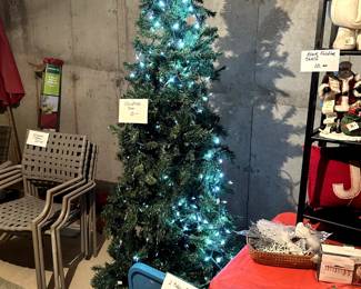 Christmas tree and big box of lights