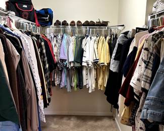 closet full of men's clothes, hats and shoes