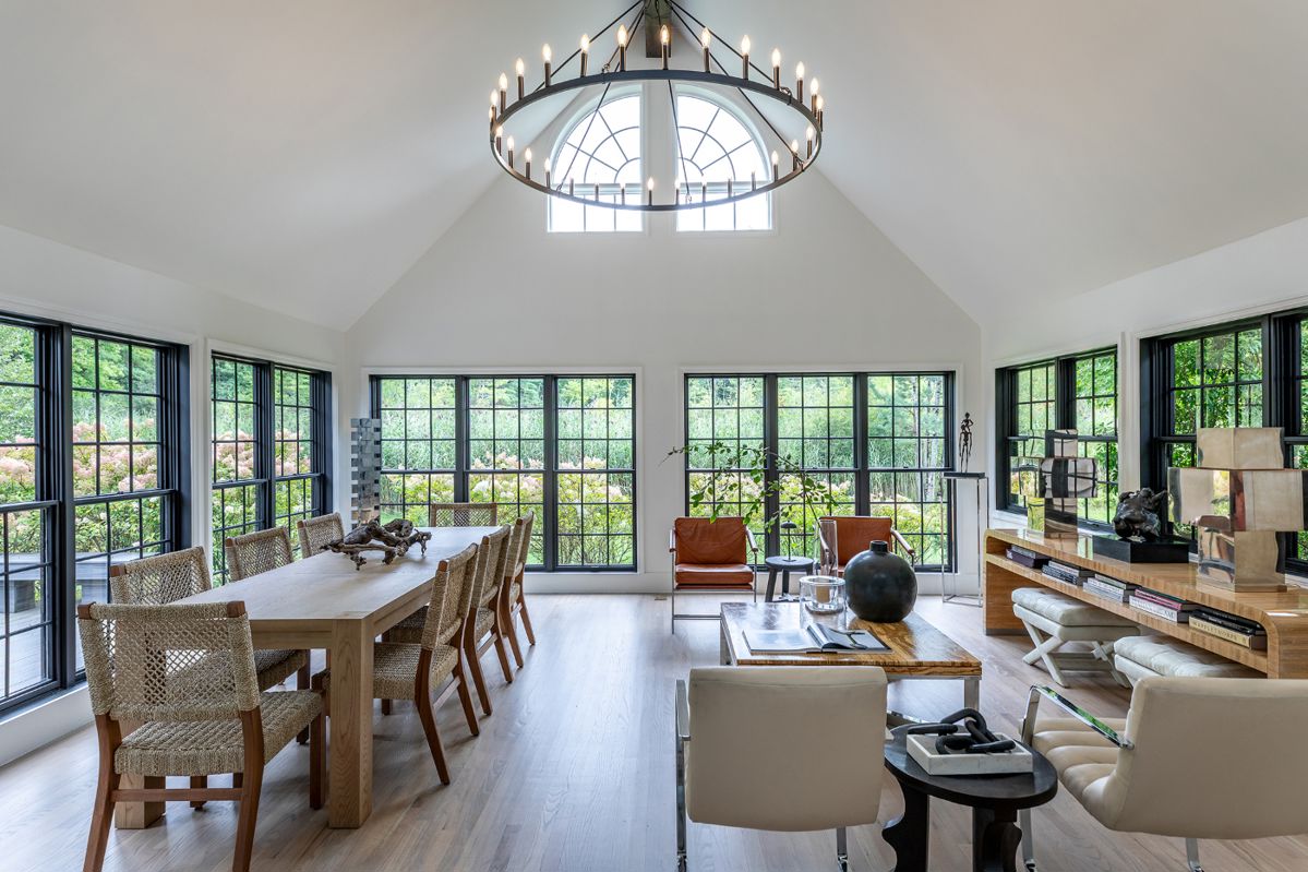 102" Oak Wood Din Table $2,000. Set of (8 ) Din Chairs $1,800. Vintage Rust/Brown Leather Armchairs $18,000 & $12,000 for Vintage Ivory Cantilever Chrs