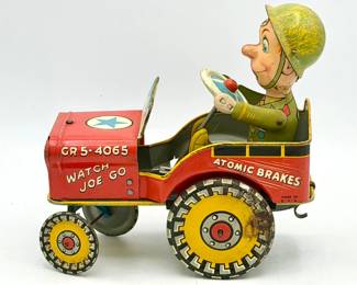 vintage tin lithographed G.I. Joe and His Jouncing Jeep wind-up toy
