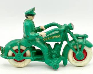 cast-iron Champion toy motorcycle with a police rider