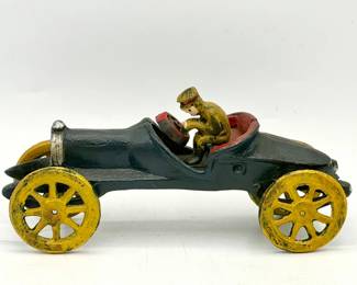 A.C. Williams cast iron boat tail racer toy car from the 1920s