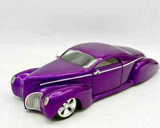 Hot Wheels 100% 1937 Lincoln Zephyr 1:18 scale diecast model in metallic purple