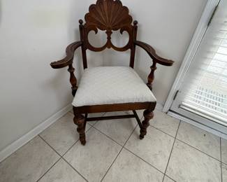. . . "Captain's" chair to antique dining table