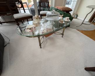 . . . glass and wrought-iron coffee table