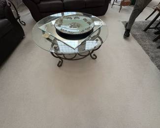 . . . another glass accent table with wrought-iron base