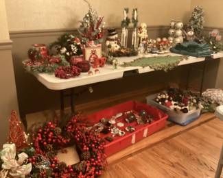 Various  Christmas decor I hope cause it sure is pain that was kind of the attraction: ornaments, wreaths, swags, snowmen, candles, linens and more