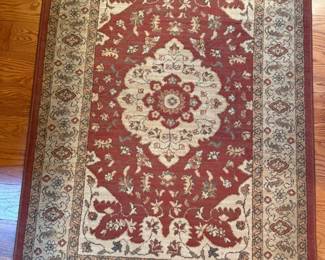 121 RustyRedandBeigeAreaRug