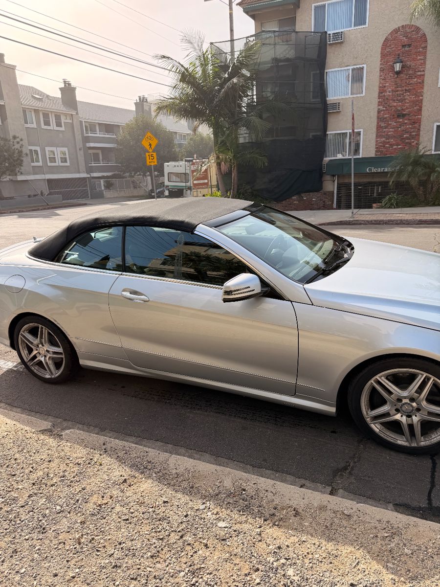 The 2011 Mercedes-Benz E-Class E550 21,000 on the odometer one owner car, old lady