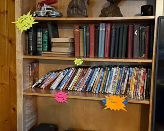 Hess truck, Tom Clark figurines, old books, dvds, old hymnals,
**Entertainment center is sold**