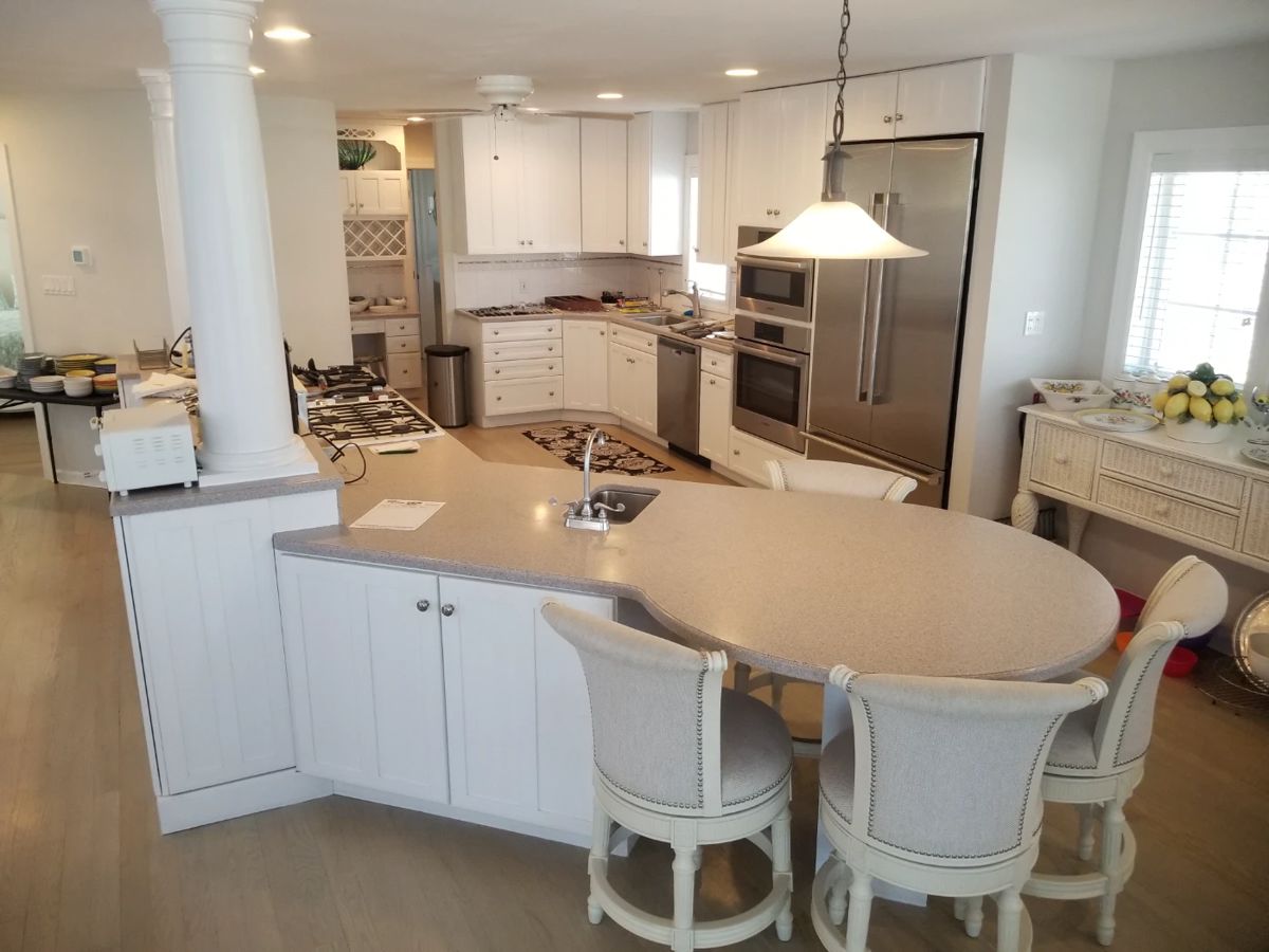 Large kitchen with island; extensive amount of cabinetry