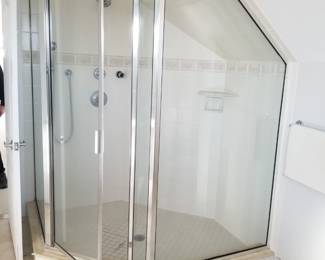 Glass shower surround