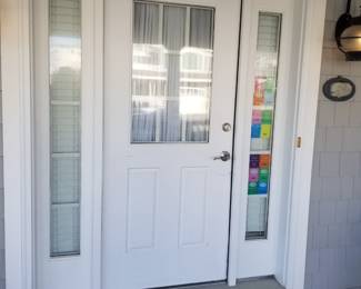 Entry door with two side lights
