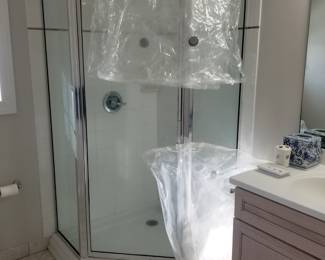 Glass shower surround