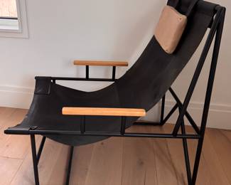 Judson Sling Chair. Ebony Leather Seating Suspended within Black Iron Frame. Measures 24" W x 34" D. Photo 2 of 2. 