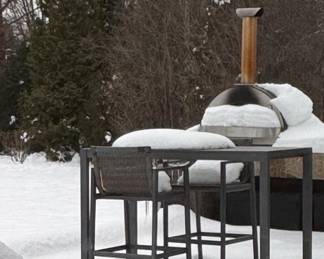 IlFornino Stainless Steel Counter Top Wood Burning with - 28" X 28" Cooking Area. Picture with RH Cast Aluminum Patio Bar Table and RH Bar Height Dining Chairs. 