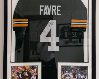 Framed and Autographed Brent Favre Green Bay Packers Jersey and Photos. 