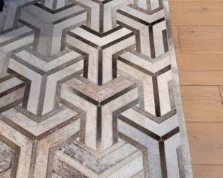 Cow Hide / Hair of Hide Patchwork Rug. Measures 10' 7" x 10' 3". Some Wear. Photo 1 of 4. 