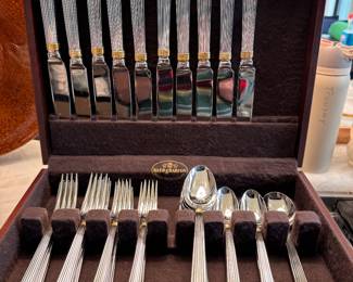 Christian Dior Gaudron Stainless Steel Flatware Set. Piece Include: 9 Spoons, 9 Dessert Spoons, 10 Luncheon Forks, 10 Dinner Forks, 10 Knives, 1 Soup Spoon, 1 Sugar Spoon & 2 Serving Forks. Photo 1 of 2. 