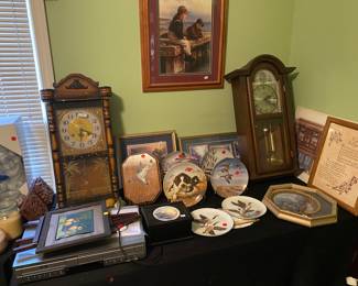 Clocks and duck plates.